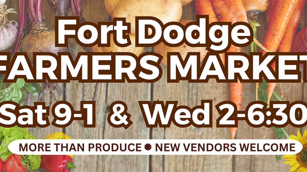 Sign for Fort Dodge Farmers Market advertises their schedule on Saturdays from 9-1 and Wednesdays from 2-6:30. 