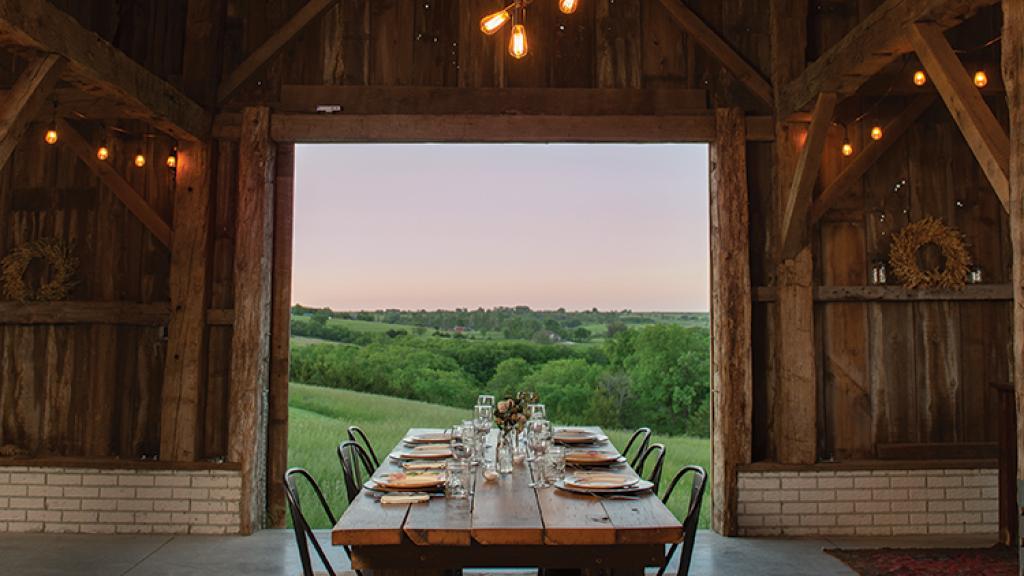 Dinners in our historic barn offer a stunning view of the picturesque North River Valley in Madison County, Iowa.